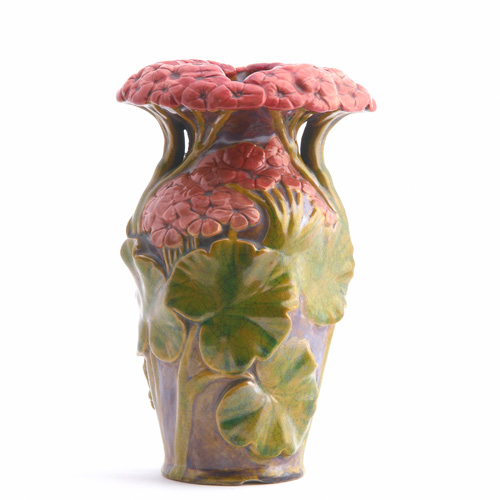 Appraisal: ZSOLNAY Vase modeled with red and pink geraniums and bright