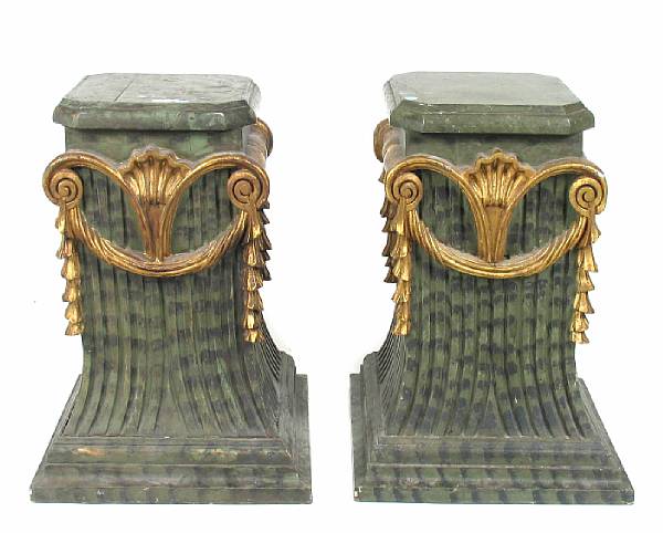 Appraisal: A pair of Italian style parcel gilt and painted pedestals