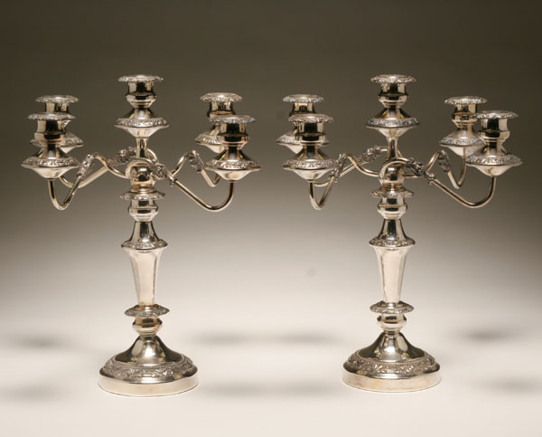 Appraisal: Pair American silverplate -light candelabra with accents of foliate decoration