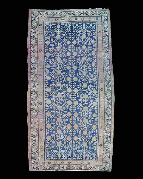 Appraisal: A Khotan carpet East Turkestan circa size approximately ft in