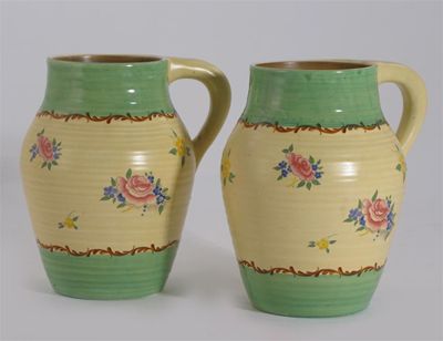 Appraisal: Pompadour' a pair of Clarice Cliff Isis jugs printed and