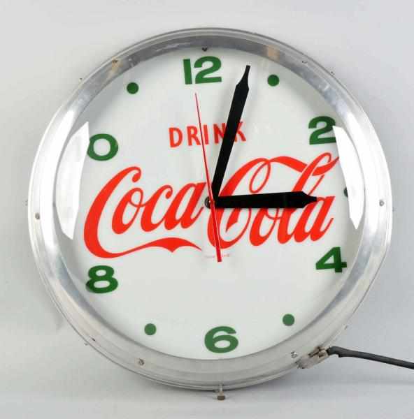 Appraisal: Coca-Cola Lighted Clock s Designed to stand the weather with