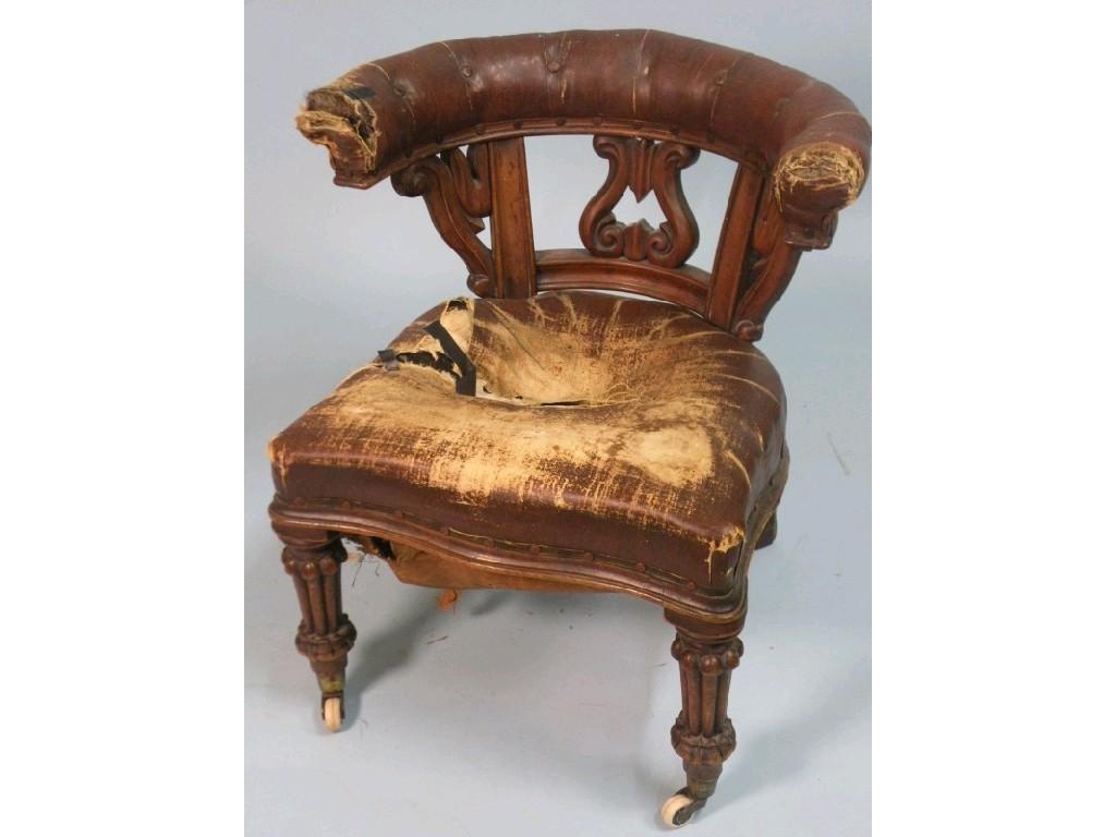 Appraisal: An early Victorian mahogany library armchair the back carved with