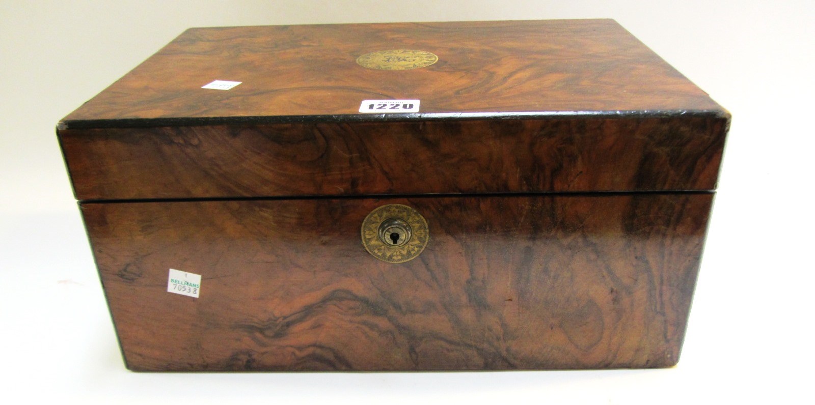 Appraisal: A Victorian figured walnut toilet box with fitted interior and