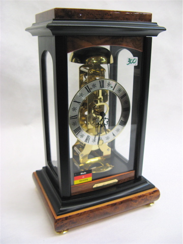 Appraisal: TWO GERMAN CLOCKS TWO SWISS SMALL MUSIC BOXES mantle clock