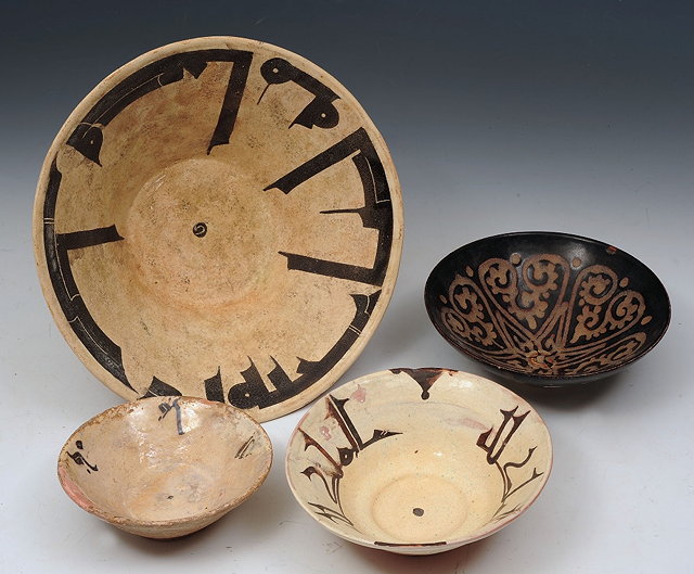 Appraisal: A LARGE ISLAMIC BOWL with Kufic script two similar smaller