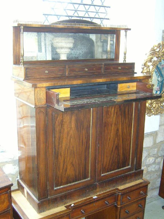 Appraisal: A Regency rosewood secretaire chiffonier the lower section enclosed by