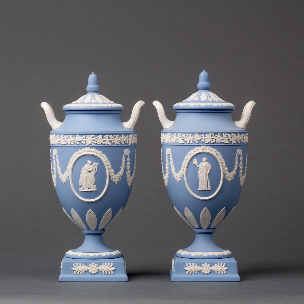 Appraisal: A PAIR OF WEDGWOOD JASPERWARE COVERED URNS A pair of