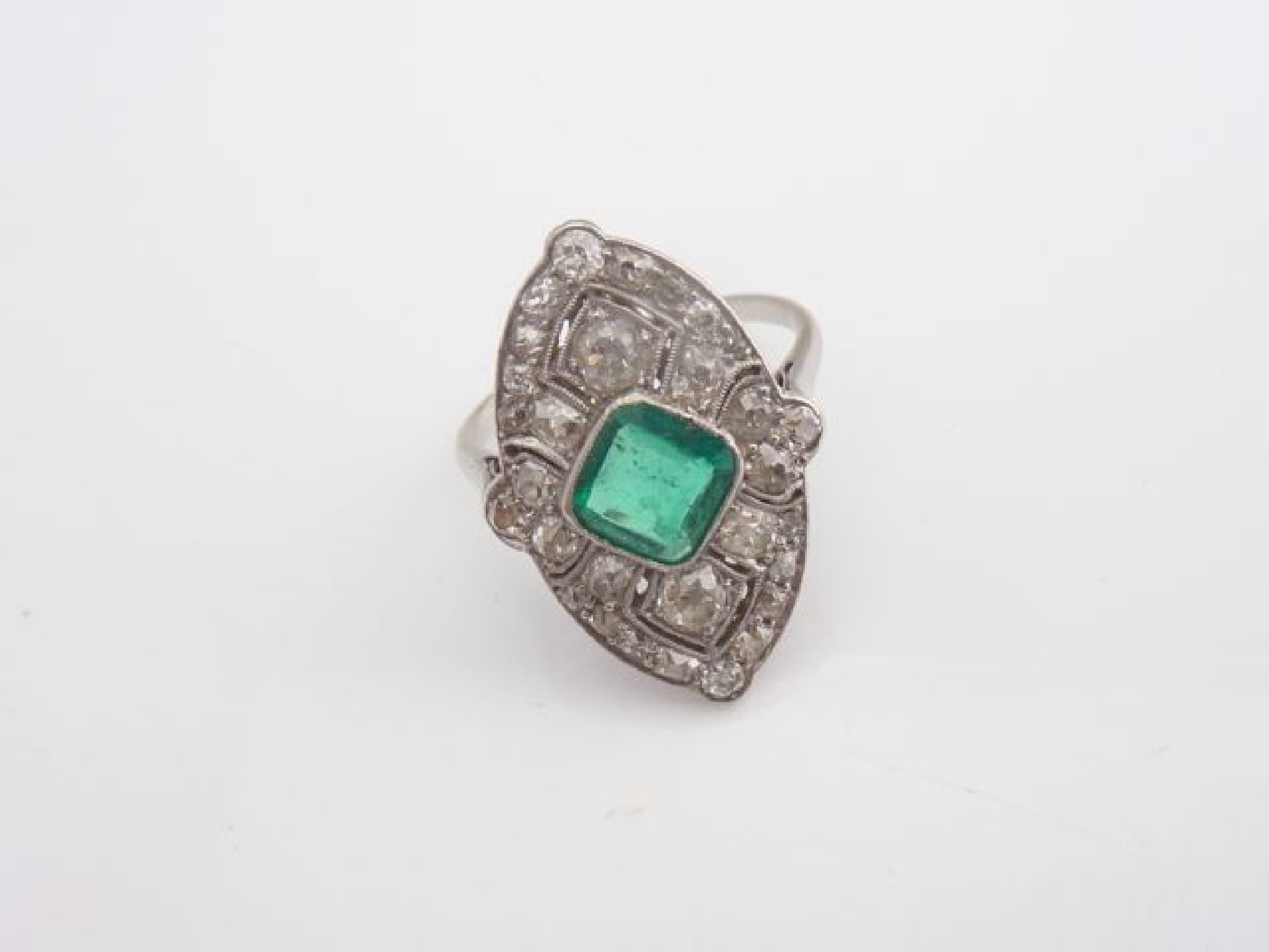 Appraisal: An Art Deco style emerald and diamond ring centred with