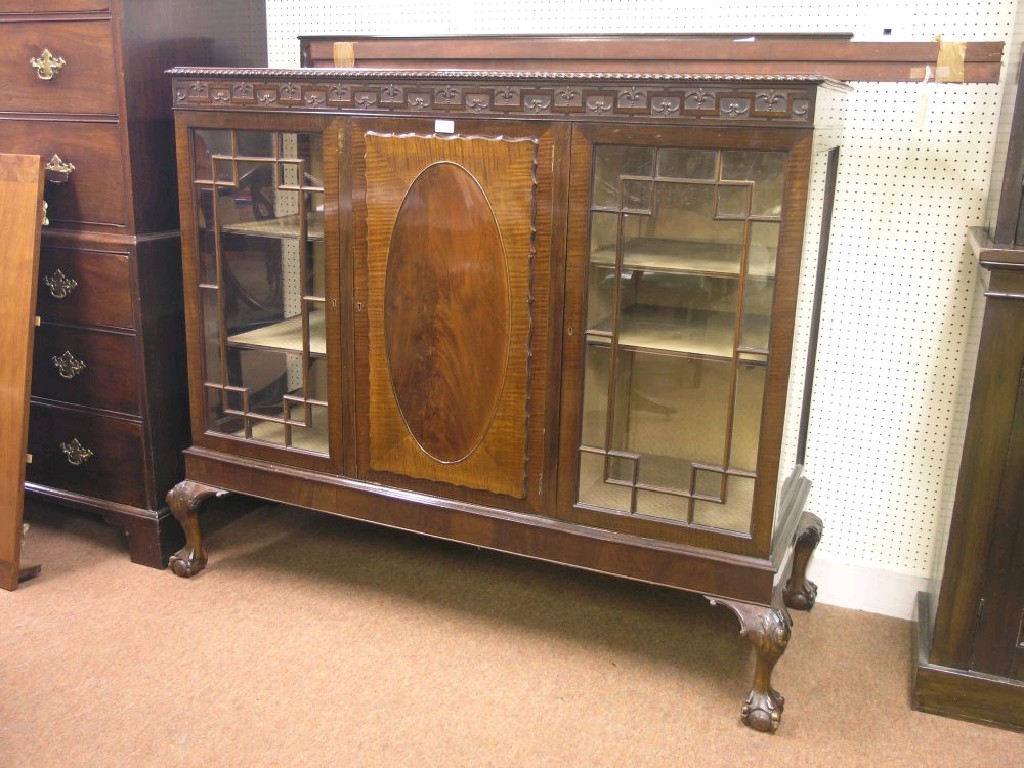 Appraisal: A George V mahogany display cabinet gadrooned top above a