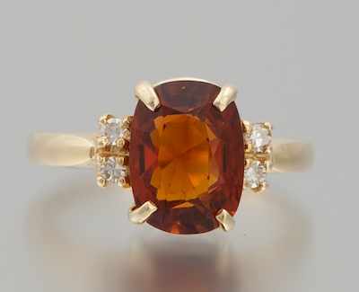 Appraisal: A Ladies' Garnet and Diamond Ring k yellow gold ring