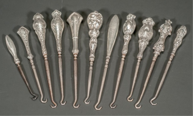 Appraisal: Collection of Eleven Sterling Button Hooks To include buttonhooks Foster