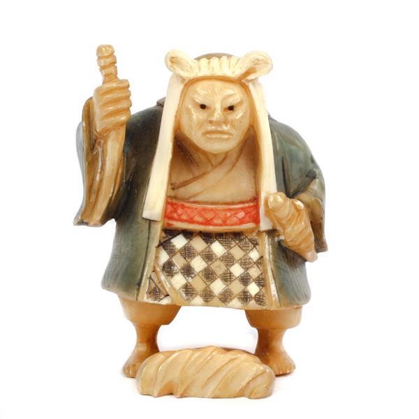 Appraisal: Japanese carved ivory polychrome netsuke figure of a Samurai warrior