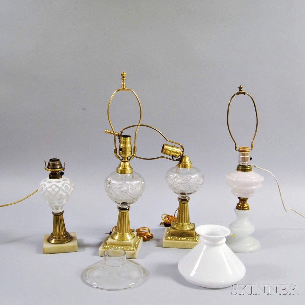 Appraisal: Four Pattern Glass Oil Lamps a pair of colorless with