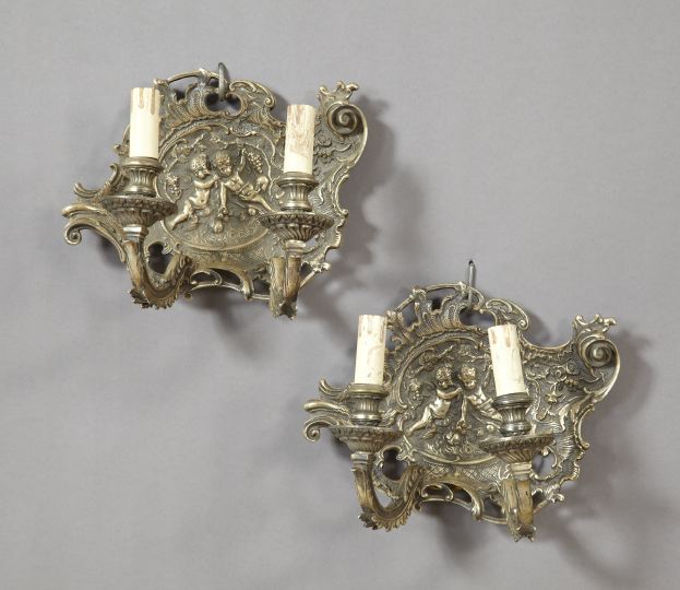 Appraisal: Large Pair of Silvered Cast-Iron Two-Light Sconces first quarter th