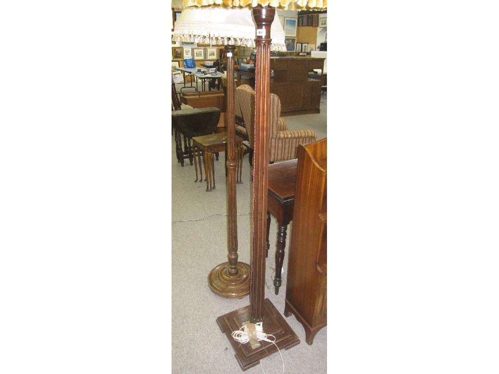 Appraisal: Lot comprising two standard lamps with reeded columns