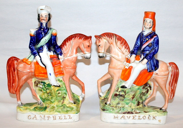 Appraisal: A PAIR OF STAFFORDSHIRE POTTERY FIGURES of 'Campbell' and 'Havelock'