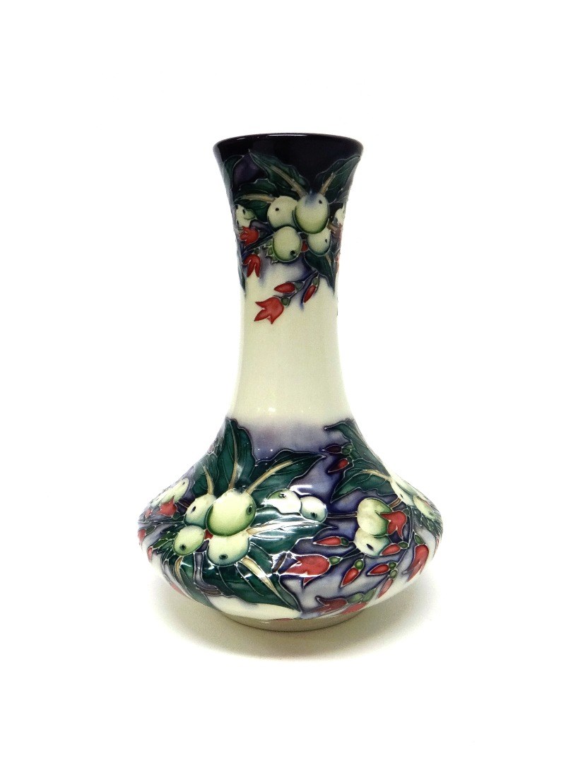 Appraisal: A Moorcroft 'Mistletoe' vase circa cream white ground cm high