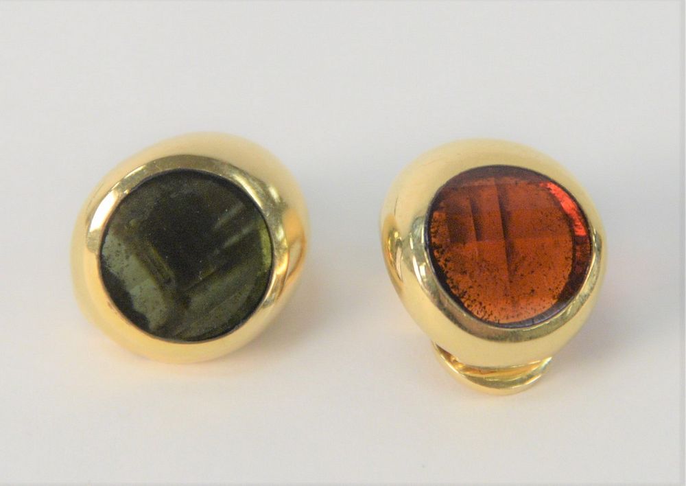 Appraisal: Pair of Pablo Karat Gold Earrings one with amber stone