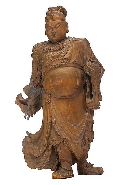 Appraisal: A large carved wood standing figure of Daoist guardian general