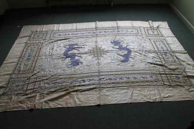 Appraisal: A CHINESE SILK TABLE COVER with central turquoise dragon within