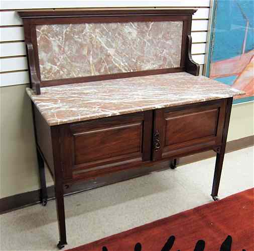 Appraisal: EDWARDIAN MARBLE AND MAHOGANY WASHSTAND English c having a rose