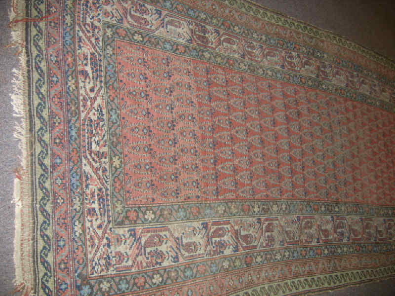 Appraisal: EARLY TH CENTURY MALAYIR LONG RUG The salmon field with