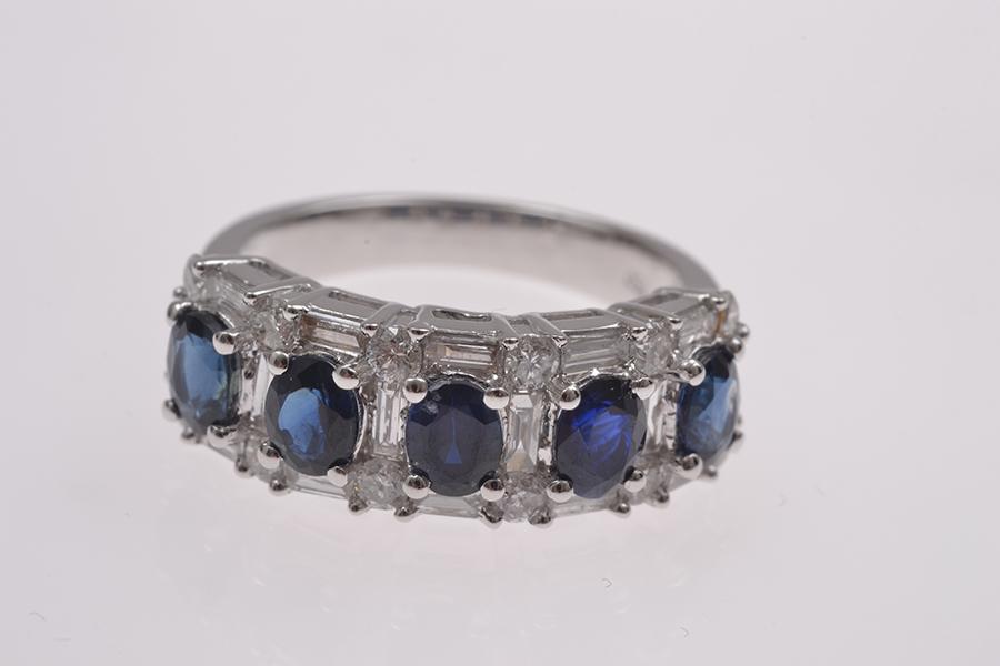 Appraisal: A SAPPHIRE AND DIAMOND SET BAND IN CT WHITE GOLD