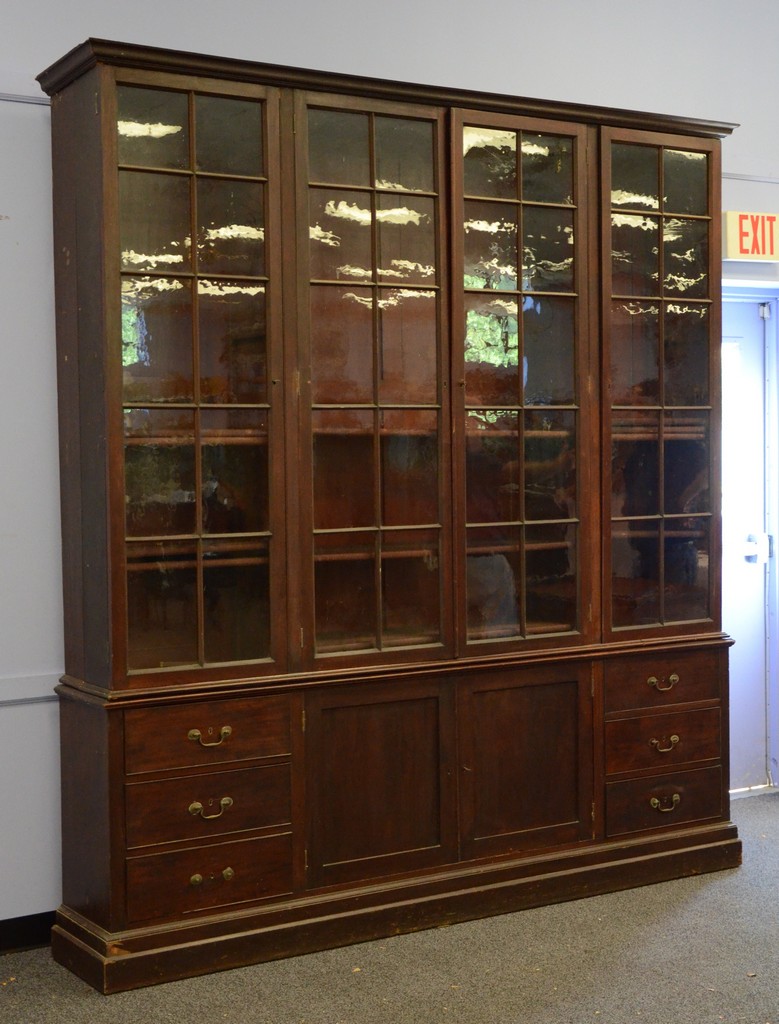 Appraisal: pc mahogany bookcase breakfront top with pane glazed doors base