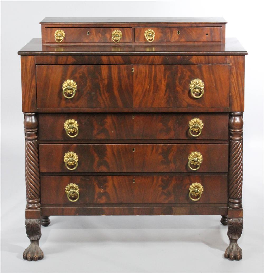 Appraisal: AMERICAN CLASSICAL CARVED MAHOGANY BONNET CHEST OF DRAWERS having a