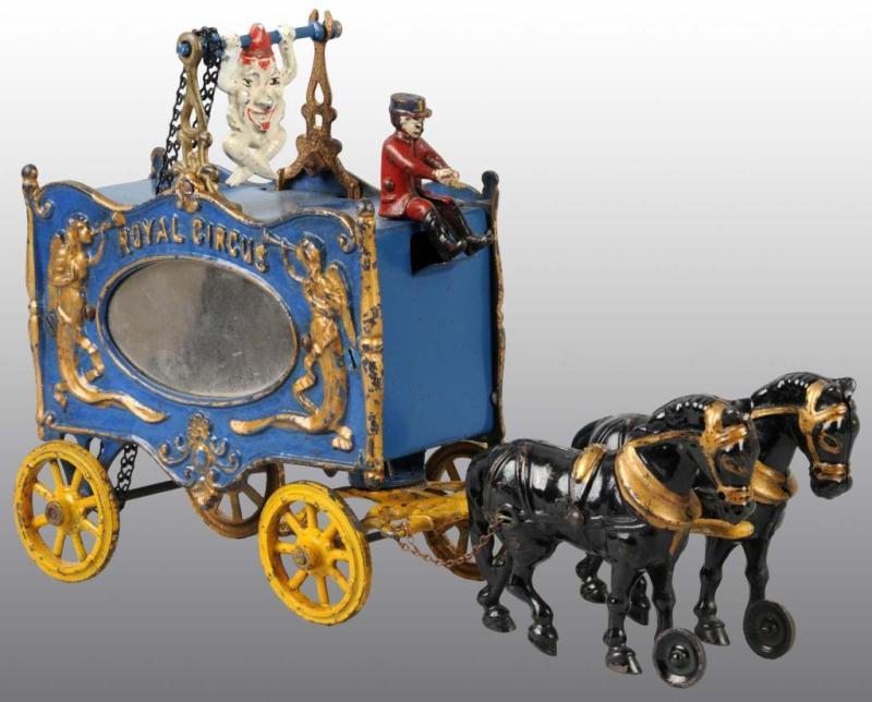 Appraisal: Cast Iron -Horse Royal Circus Trapeze Wagon Toy Description Includes