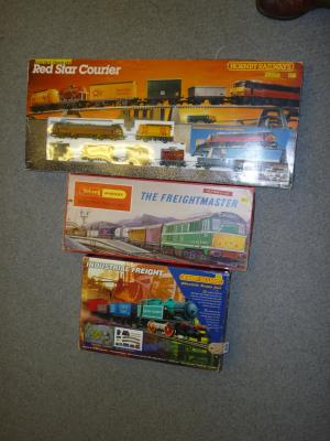 Appraisal: Three Hornby train sets comprising starter set Industrial Freight Red