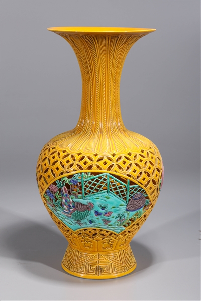 Appraisal: Chinese yellow glazed famille rose enameled porcelain lattice work vase