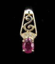 Appraisal: Ladies' Ruby Diamond Pendant K yellow gold pendant with a