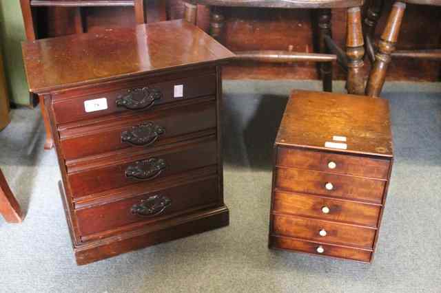 Appraisal: A MINIATURE EDWARDIAN WALNUT CHEST of four drawers with stylised