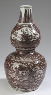 Appraisal: Chinese Ming-style double-gourd porcelain vase in a copper-red glaze the