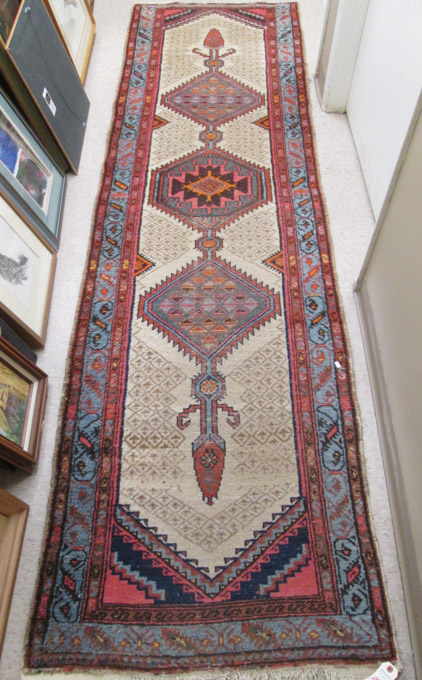 Appraisal: SEMI-ANTIQUE PERSIAN HAMADAN TRIBAL RUNNER hand knotted in a three