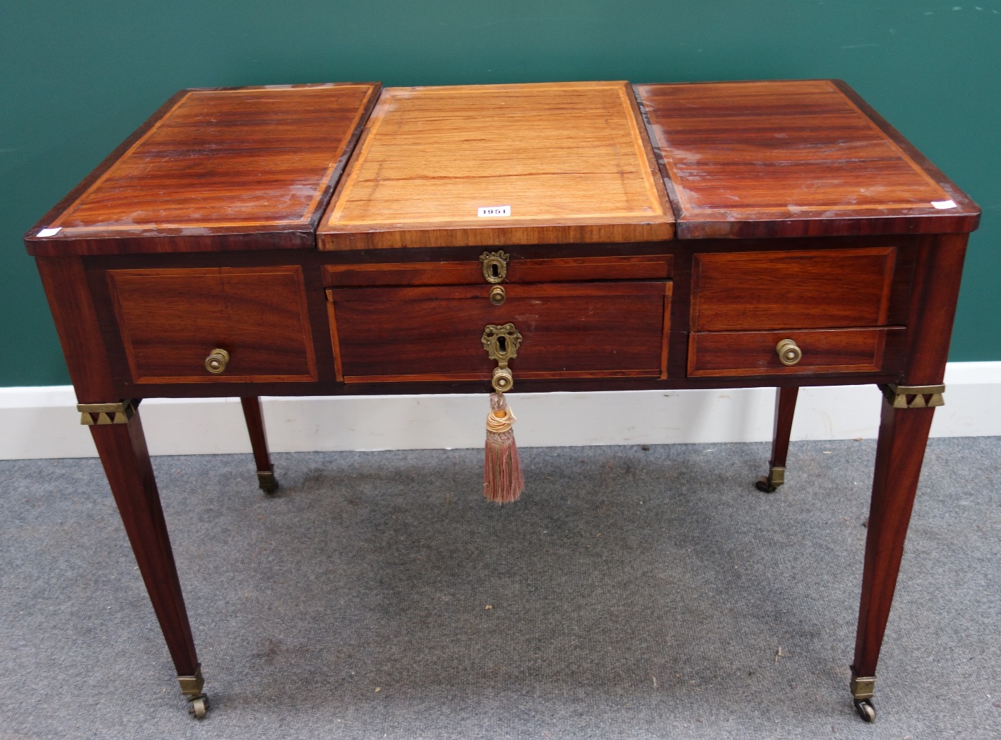 Appraisal: A th century continental inlaid kingwood dressing table on tapering