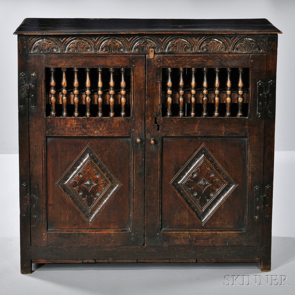 Appraisal: Two-door Oak Livery Cupboard th th century with a lunette-carved