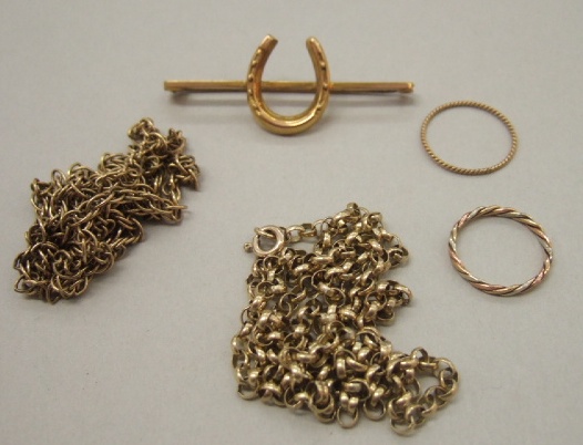 Appraisal: A gold multiple link neckchain on a boltring clasp a