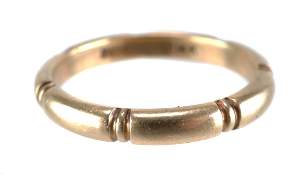 Appraisal: k yellow gold band with bamboo design marked k Orange