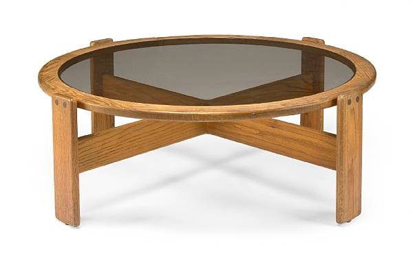 Appraisal: A Lou Hodges oak and glass coffee table California Design