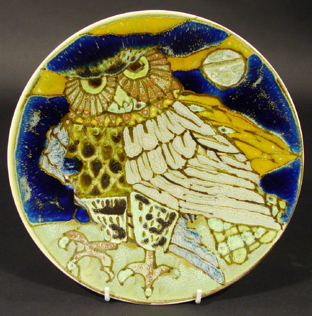 Appraisal: Rare Poole Pottery Delphis charger decorated in colourful glazes with