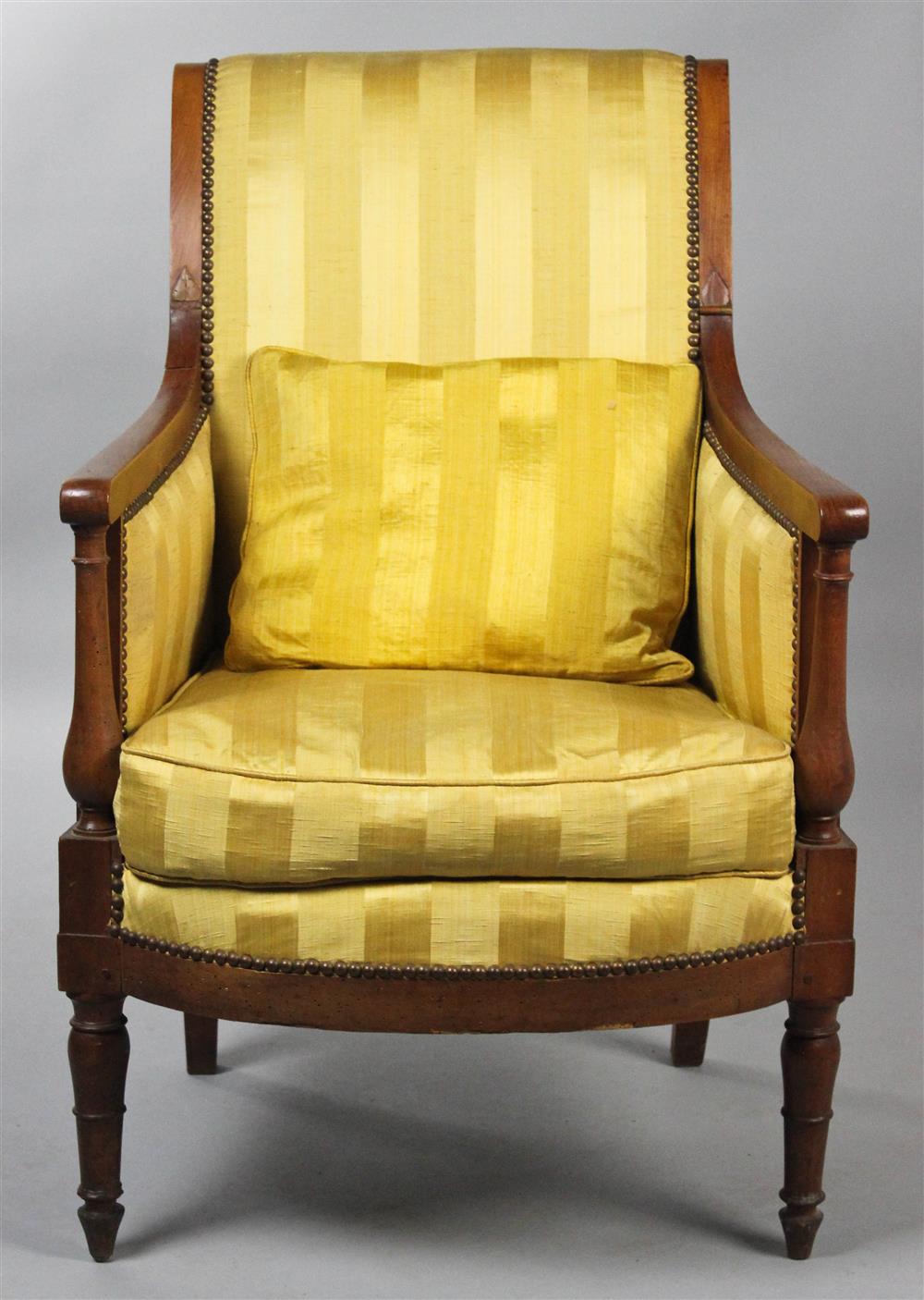 Appraisal: CONTINENTAL FRUITWOOD ARM CHAIR the backscrolling padded cresting continuing to