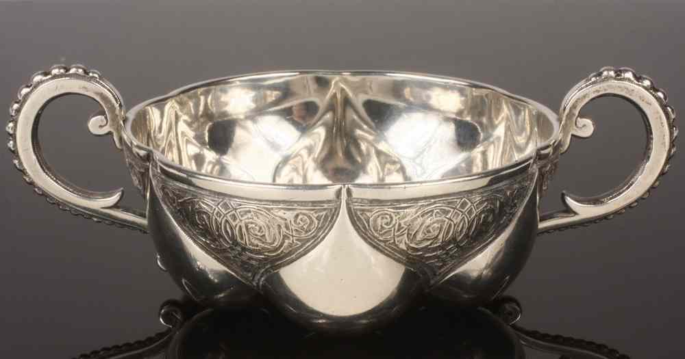 Appraisal: RUSSIAN SILVER WINE TASTING CUP - Silver Two-Handled Wine Tasting