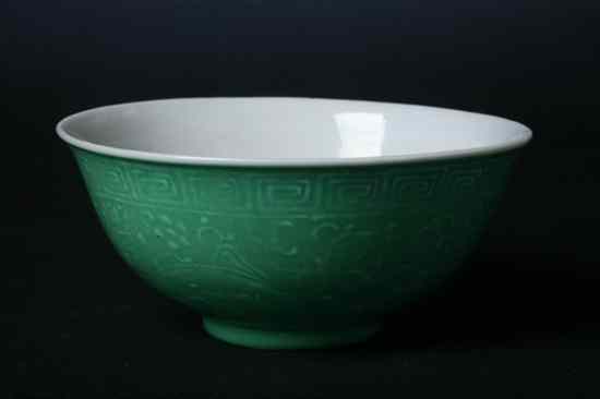 Appraisal: CHINESE APPLE GREEN PORCELAIN BOWL Qianlong iron red four-character mark