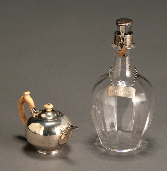 Appraisal: English Silver Miniature Teapot and a Silver Mounted Glass Decanter