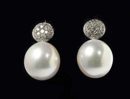 Appraisal: PEARL AND BRILLIANT-CUT DIAMOND STUD EARRINGS White gold Elegant stud