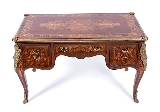 Appraisal: A Louis XV Style Gilt Bronze Mounted Marquetry Writing Table