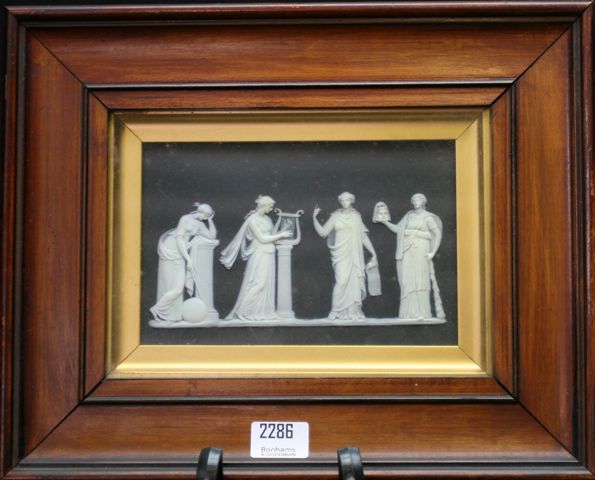 Appraisal: A framed Jasperware panel depicting the four arts in classical